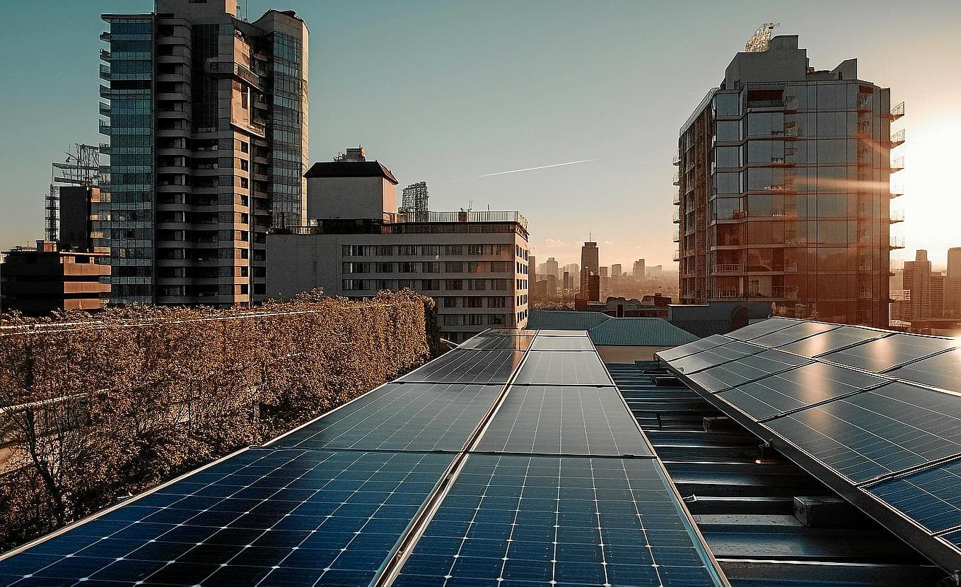 Modern skyscrapers emit solar energy into night sky generated by AI